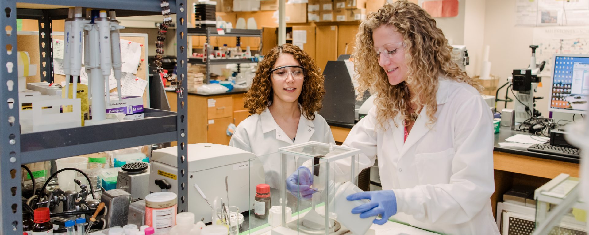 Zahra Ghassemi & Laura Simpson, CENG PhD '19, working in the lab. Photo courtesy of Marlayna Demond ’11 for UMBC.